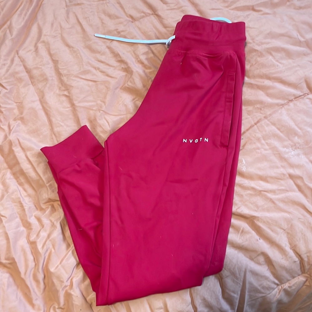 Small NVGTN red joggers.